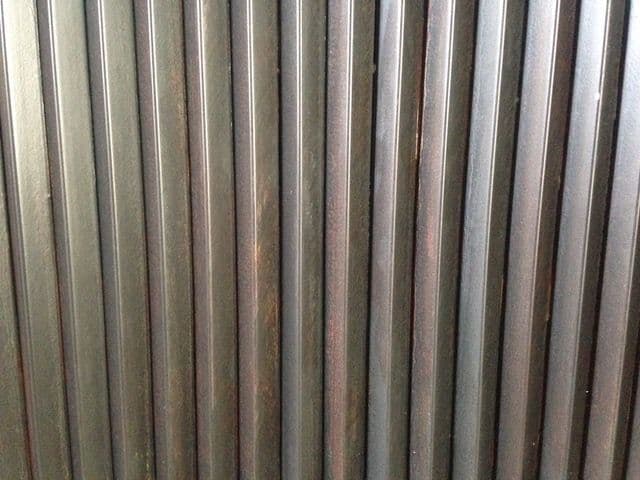 Close-up of the machined iron angle back of a made-to-measure bioethanol fireplace